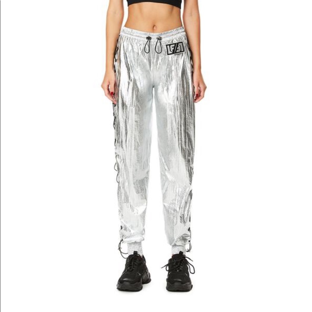 Silver track pants with side strings